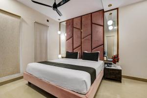 Postel nebo postele na pokoji v ubytování Astra Hotels & Suites - Koramangala