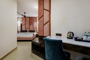 Postel nebo postele na pokoji v ubytování Astra Hotels & Suites - Koramangala