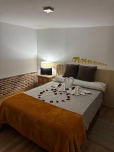 Ένα ή περισσότερα κρεβάτια σε δωμάτιο στο Apartamentos Mayte