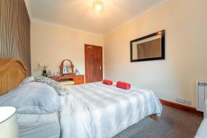 Postel nebo postele na pokoji v ubytování Prime location rooms in high street