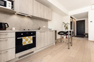 Η κουζίνα ή μικρή κουζίνα στο Modern Apartment with Great View +14 φωτογραφίες