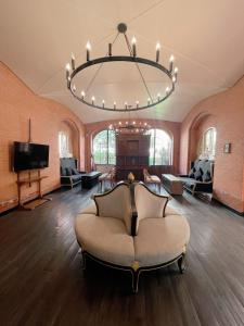 Posezení v ubytování Venetian Signature Condo Pattaya