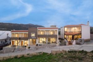 an image of a building with lights on at Psaromoura Residence in Agia Pelagia