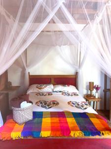 Voodi või voodid majutusasutuse Hostal Olmito Canoa toas