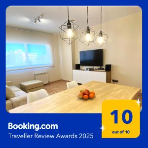 A television and/or entertainment centre at Atico duplex en Malgrat de Mar