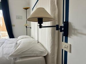 Postel nebo postele na pokoji v ubytování Casa Bella Capri