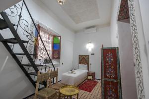 Postel nebo postele na pokoji v ubytování Dar Amazigh
