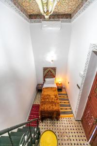 Postel nebo postele na pokoji v ubytování Dar Amazigh