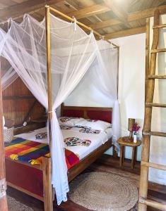 Voodi või voodid majutusasutuse Hostal Olmito Canoa toas