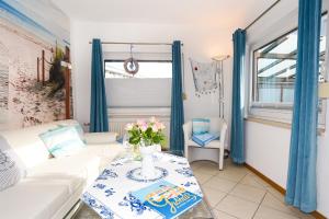 Χώρος καθιστικού στο Haus Strandperle Bungalow