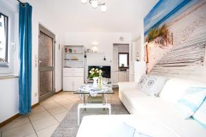 Η κουζίνα ή μικρή κουζίνα στο Haus Strandperle Bungalow