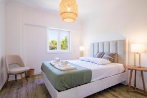 Katil atau katil-katil dalam bilik di Cascais Duplex Apartment