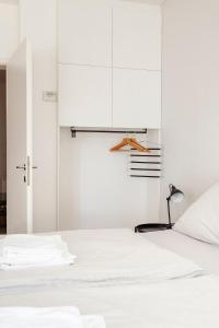 Postel nebo postele na pokoji v ubytování HAY Apartment Bled