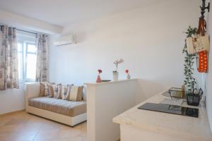 a living room with a couch and a table at Casa Selimi in Ulcinj +227 photos