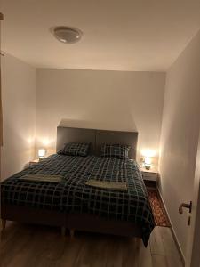 Posteľ alebo postele v izbe v ubytovaní Apartmani Poljančić