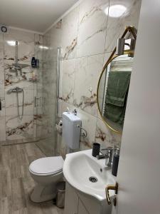 Kúpeľňa v ubytovaní Apartmani Poljančić
