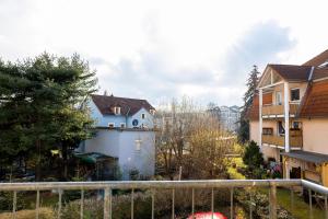 a view from the balcony of a house at NEW - NORA Stays Studio - Messe - Airport in Dresden