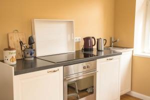 Kuchyň nebo kuchyňský kout v ubytování Gudd Stuvv in Annis Haus