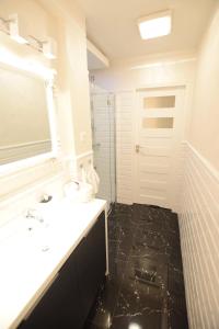 Kúpeľňa v ubytovaní Elegant Apartment Foksal