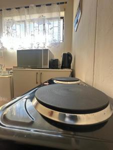 Kuchyň nebo kuchyňský kout v ubytování The Cozy Corner Windhoek 24 Hours + 8 fotografií