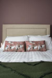 Letto o letti in una camera di The Monks Quarters