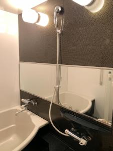 Vannituba majutusasutuses ホテルR-Adult only-lovehotel