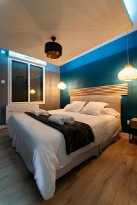 Posteľ alebo postele v izbe v ubytovaní Escapade Relaxante - Spa - Jacuzzi - Sauna - Privés