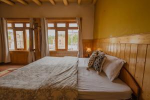 Postel nebo postele na pokoji v ubytování The Destination Homestay