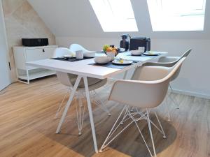 TV a/nebo společenská místnost v ubytování Eck am Meer 6