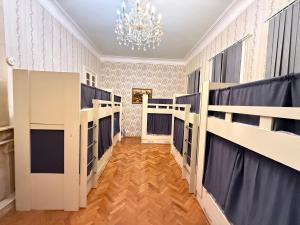 Postel nebo postele na pokoji v ubytování KM Hostel and Tourism
