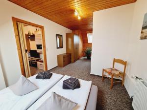 Ένα ή περισσότερα κρεβάτια σε δωμάτιο στο Küstenhaus Fewo klein