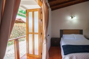 Postel nebo postele na pokoji v ubytování Finca Hotel 12 Palmas- Aeropuerto JMC + 37 fotografií