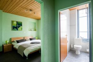 Postel nebo postele na pokoji v ubytování Hotel Acacia