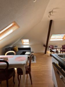 a living room with a couch and a table at Hobacher0503 in Lucerne +9 photos