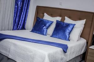 Ένα ή περισσότερα κρεβάτια σε δωμάτιο στο Monitaet Apartments