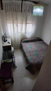Postel nebo postele na pokoji v ubytování Cuarto Privado Doble en Toledo