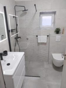 Et badeværelse på Dome&Mare