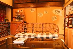Letto o letti in una camera di Here Sleep Guesthouse