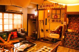 Area soggiorno di Here Sleep Guesthouse
