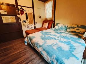 Letto o letti in una camera di Here Sleep Guesthouse