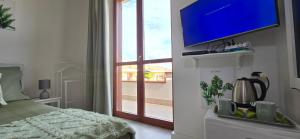 Posteľ alebo postele v izbe v ubytovaní Casa Rosy - Stanza privata con bagno esclusivo e parcheggio gratuito