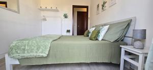 Posteľ alebo postele v izbe v ubytovaní Casa Rosy - Stanza privata con bagno esclusivo e parcheggio gratuito