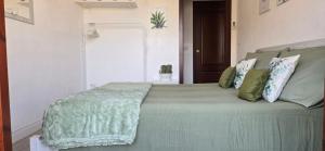 Posteľ alebo postele v izbe v ubytovaní Casa Rosy - Stanza privata con bagno esclusivo e parcheggio gratuito