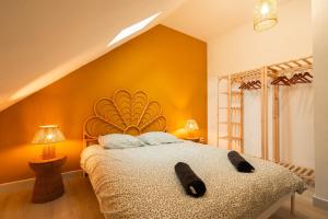 Ένα ή περισσότερα κρεβάτια σε δωμάτιο στο Appartement 2 chambres pour 4 à 6 personnes Calais