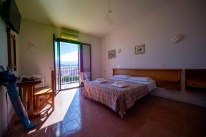 Postel nebo postele na pokoji v ubytování Hotel-Pensione 4 Stagioni