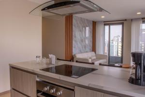 Η κουζίνα ή μικρή κουζίνα στο Coliving Ecuador Edificio Efyra La Carolina Quito