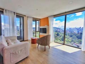 Μια τηλεόραση ή/και κέντρο ψυχαγωγίας στο Coliving Ecuador Edificio Efyra La Carolina Quito