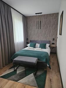 Posteľ alebo postele v izbe v ubytovaní Apartament Zamkowe Wzgórze