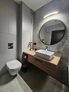 Kúpeľňa v ubytovaní Apartament Zamkowe Wzgórze