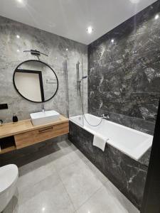 Kúpeľňa v ubytovaní Apartament Zamkowe Wzgórze